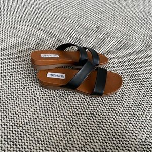 Steve Madden Sandals. Black slip-ons.